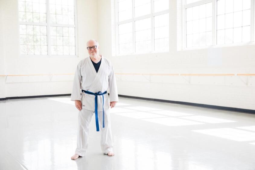‘Totally Present:’ Theatre Professor Earns Black Belt in Martial Arts